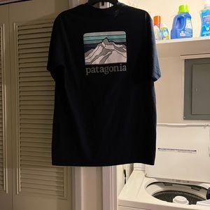 Dark blue Patagonia shirt.